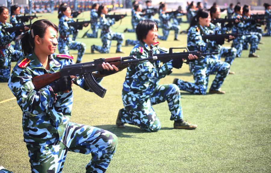 Female freshmen are unique sight in military show