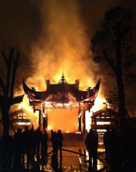Fire destroys covered bridge in SW China