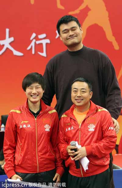 Yao Ming tries a smaller ball