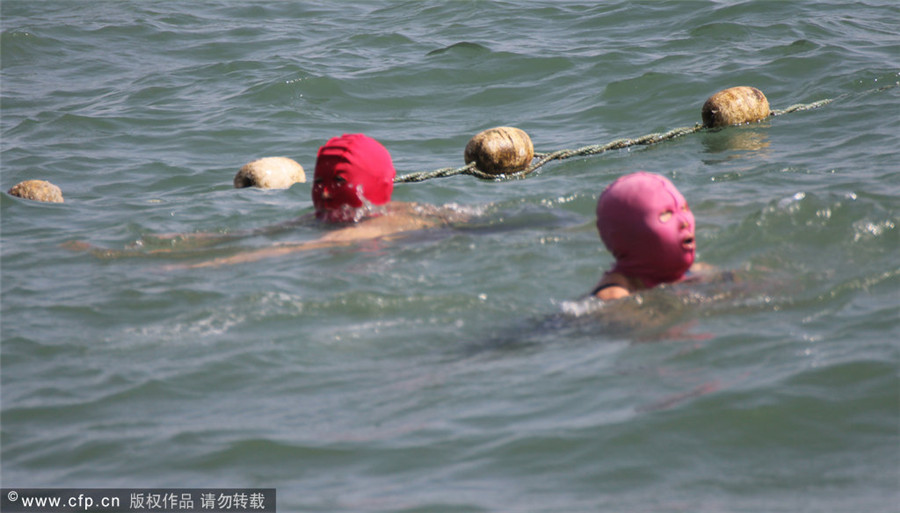 'Face-Bikini' swimwear trend sweeps East China