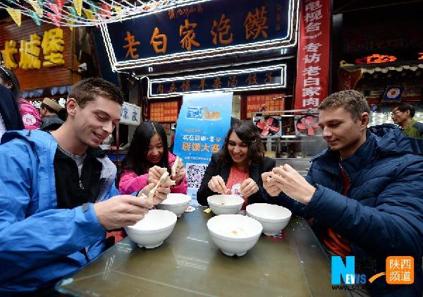 Xi’an old shop hosts steamed bun chopping contest