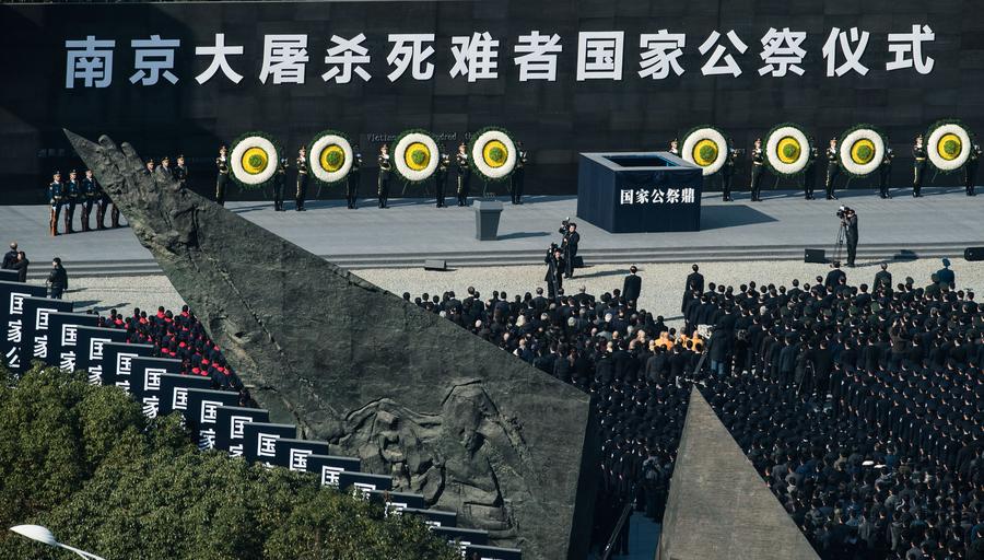 China marks first National Memorial Day