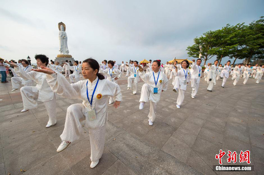 Hundreds of people practice tai chi in spring