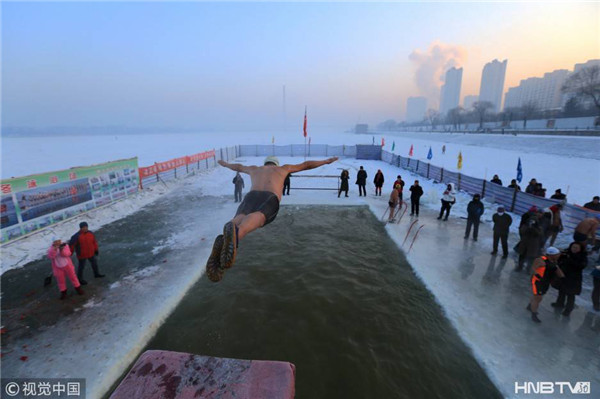 Winter swimmers enjoy frozen New Year’s Day