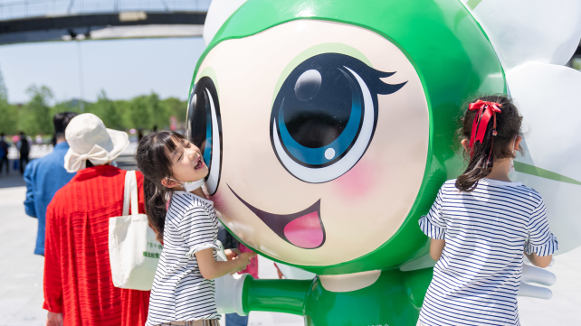 A girl enjoys a day at the venue for the expo