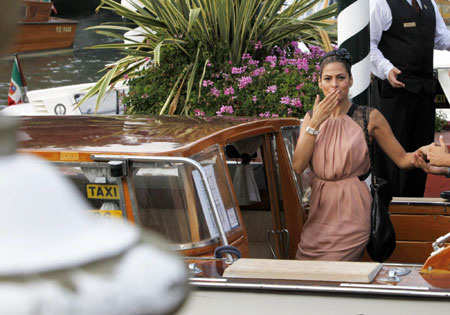 Eva Mendes arrives for a photocall at the Venice Film Festival