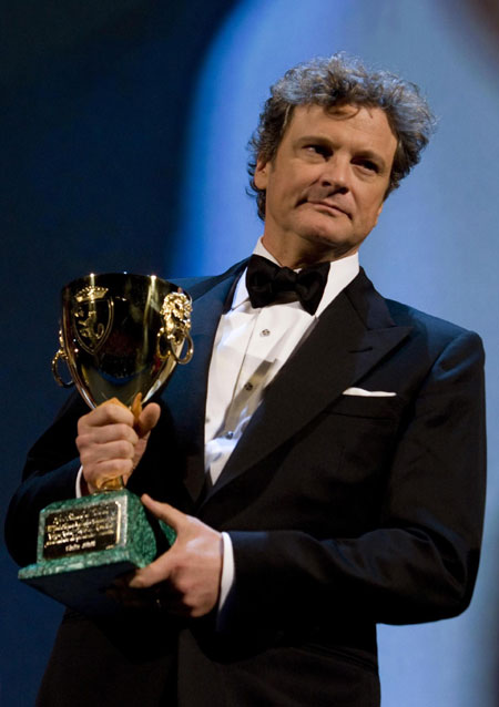 Actor Colin Firth holds the Coppa Volpi for Best Actor at 66th Venice