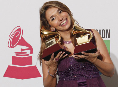 Kenny G and other singers at 9th Latin Grammy Awards in Houston