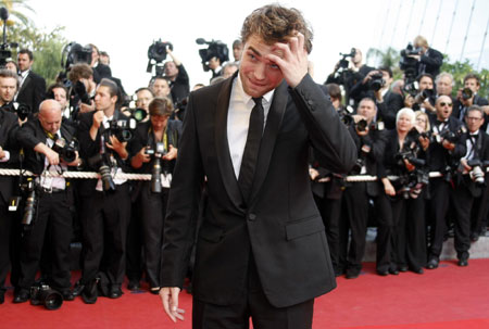 Robert Pattinson arrives on the red carpet for the screening of film at Cannes