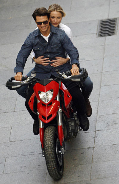 Cruise and Diaz ride motorbike during the filming of 