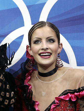 Tanith Belbin and Benjamin Agosto (L) from the U.S. celebrate after their free dance in the ice dancing competition during the Figure Skating at the Torino 2006 Winter Olympic Games in Turin, Italy, February 20, 2006. 