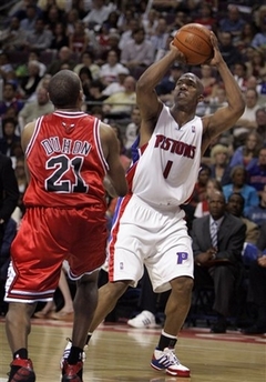 Detroit Pistons guard Chauncey Billups (1) shoots against Chicago Bulls guard Chris Duhon during the first quarter of an NBA playoff second-round basketball game at the Palace of Auburn Hills, Mich., Saturday, May 5, 2007. (AP