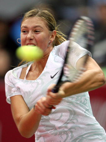 Sharapova wins over compatriot at home