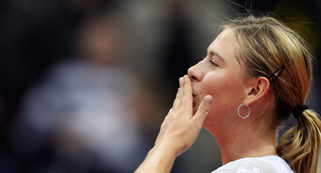 Sharapova wins over compatriot at home