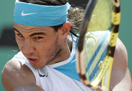 Hewitt, Nadal advance at French Open