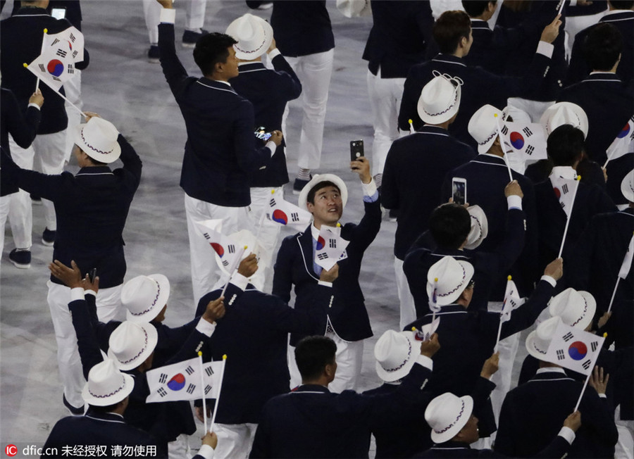 Athletes march at Olympic Opening Ceremony