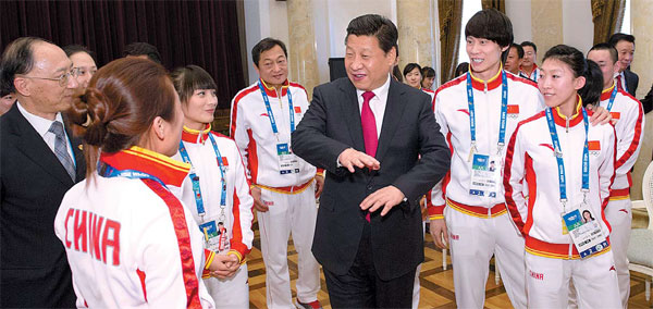 Display your spirit, Xi tells athletes