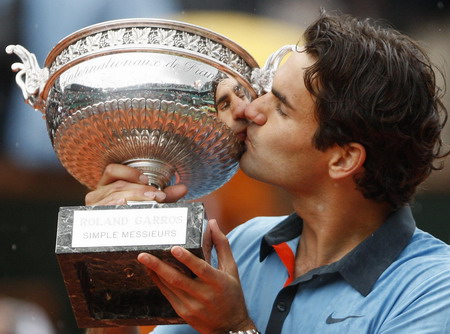 Grand Slam Federer storms to French Open glory