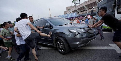 China's top 10 sports scandals: Football fan kicks ref for red card