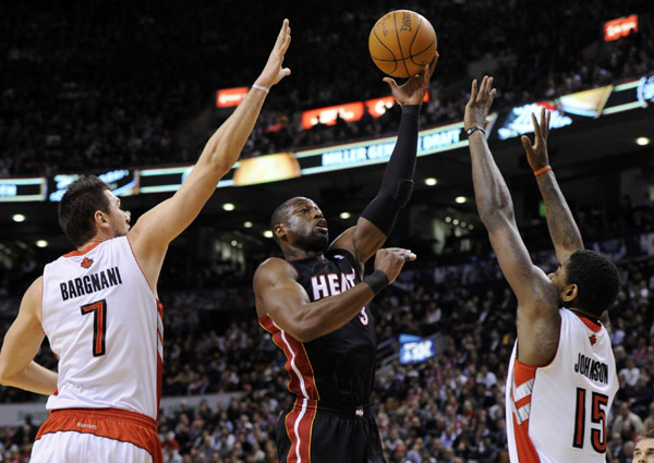 Heat beat Raptors in Bosh homecoming