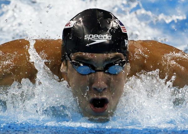 Phelps takes 3rd gold at swim worlds in 100 fly
