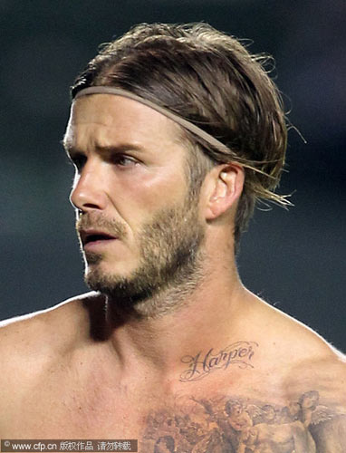 Beckham reveals new tattoo of daughter's name