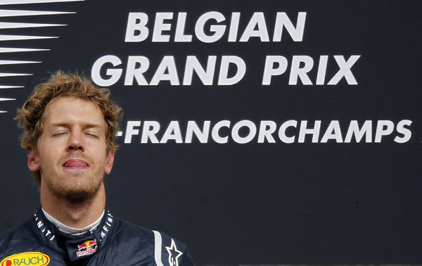 Vettel converts pole into win in Belgium