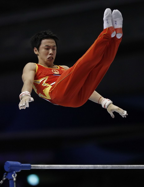 China wins 2 more golds at gymnastics worlds