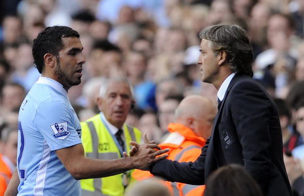 Tevez fined four weeks' wages by Man City