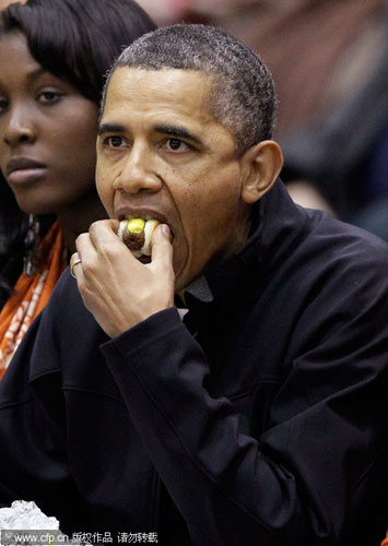 Obama and wife attend NCAA basketball game