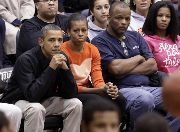 Obama and wife attend NCAA basketball game