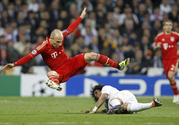Bayern stuns Real in shootout to set up Chelsea final