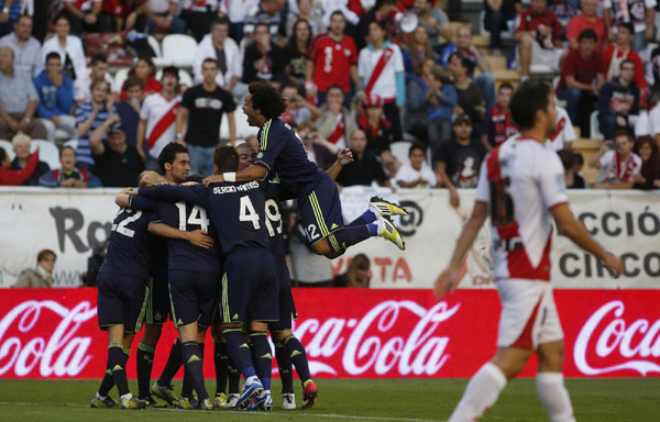 Real Madrid labour to 2-0 win at lowly Rayo