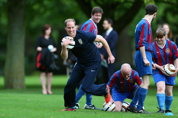 A football match hosted at Buckingham Palace