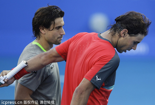 Nadal loses to Ferrer on return to courts