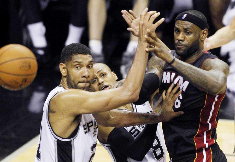 James carries Heat past Spurs to tie NBA Finals