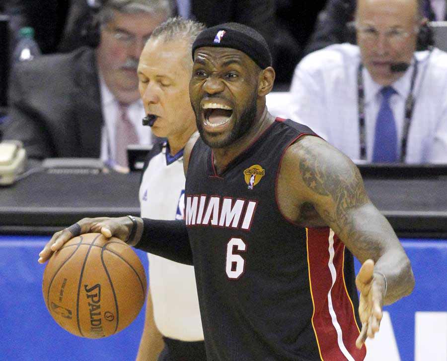 James carries Heat past Spurs to tie NBA Finals