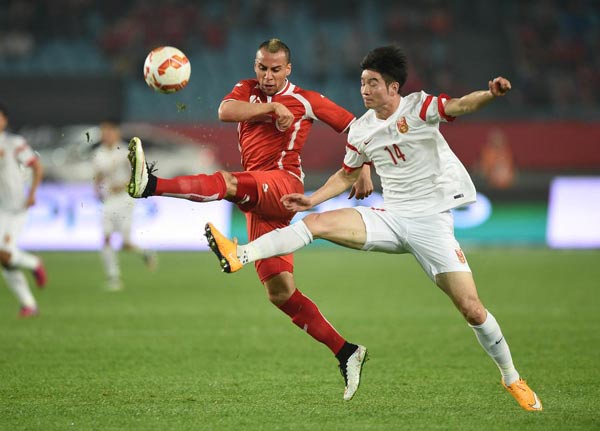 Last goal helps China tie Tunisia at Friendly