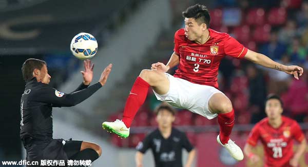 Late penalty stuns Guangzhou Evergrande