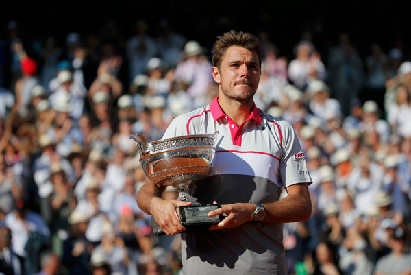 Inspired Wawrinka tames Djokovic to win French Open