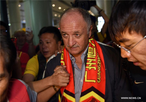 Evergrande's new coach Scolari arrives in Guangzhou