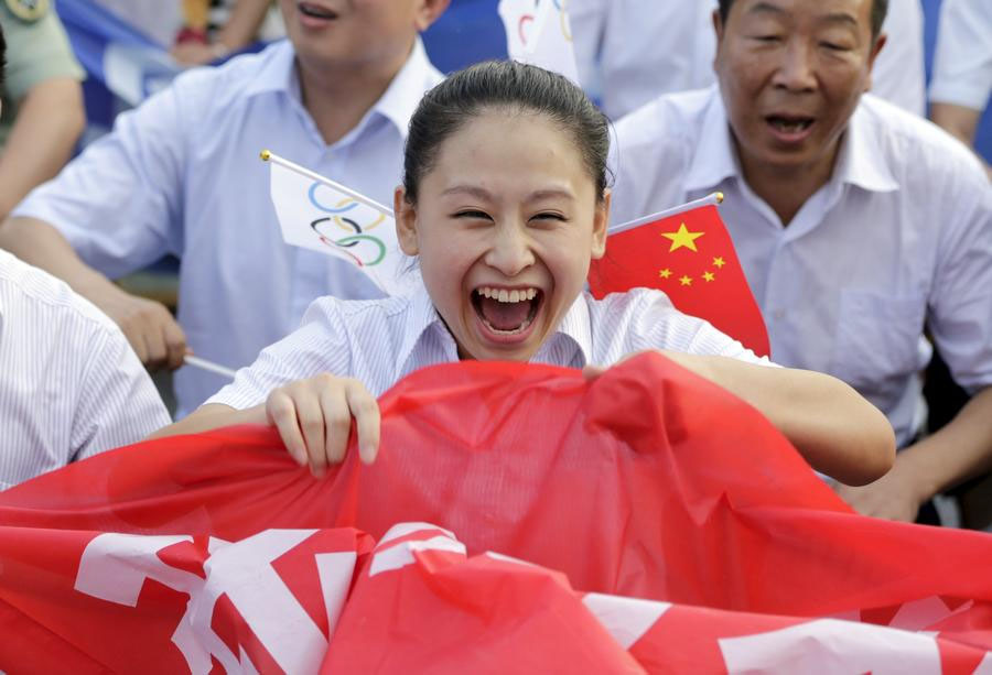 Chinese celebrate Beijing's win