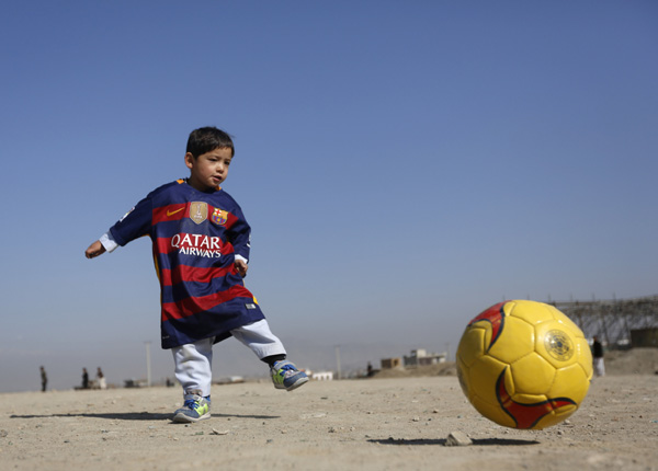 Afghan boy who wore plastic bag 'Messi' shirt gets signed jersey from soccer star