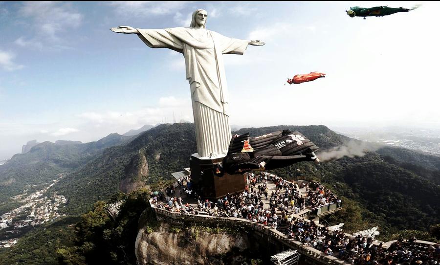 Wingsuit flyers soar over Christ the Redeemer statue
