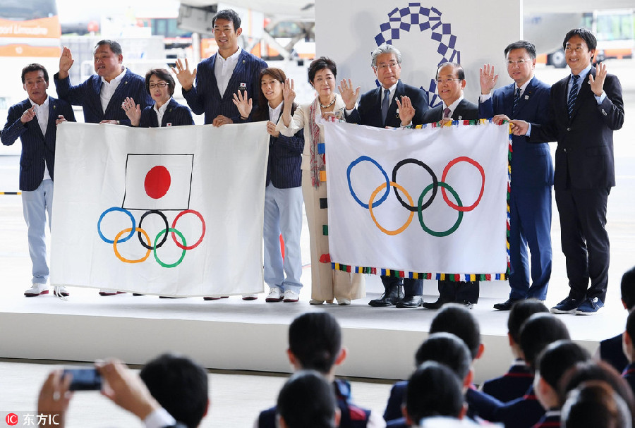 Tokyo welcomes the Olympic flag
