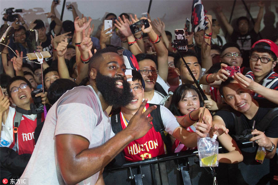 Chinese fans of NBA star James Harden of Houston Rockets hold up Harden  jerseys at the Shanghai Hongqiao International Airport in Shanghai, China,  29 Stock Photo - Alamy