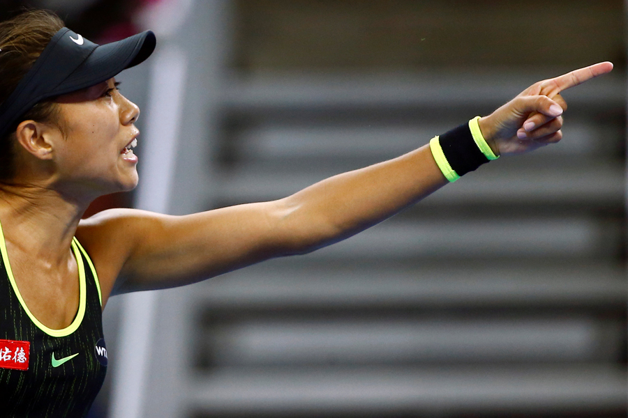 China's Zhang Shuai wins tiebreaker to enter third round