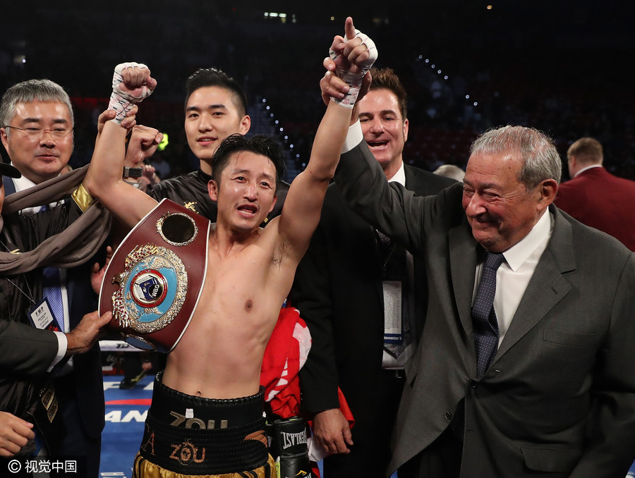 Zou Shiming secures first gold at WBO flyweight championship