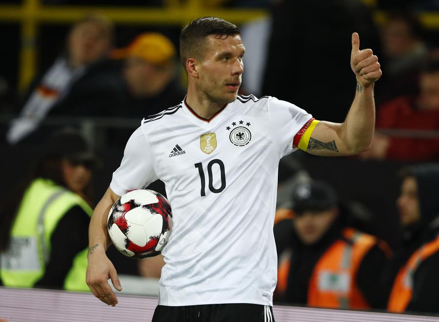 Podolski gets perfect send-off with winning goal for Germany