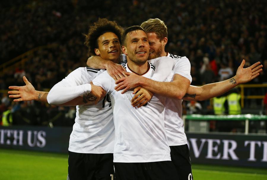 Podolski gets perfect send-off with winning goal for Germany